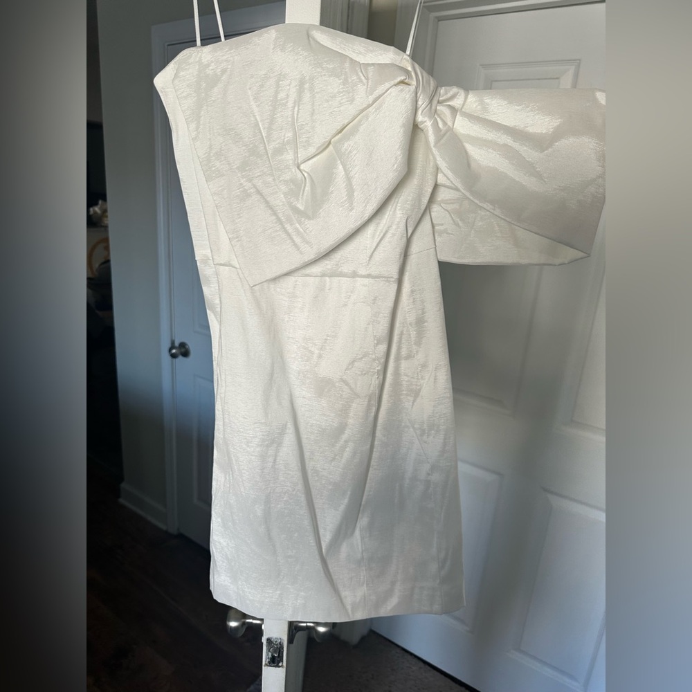 Off shoulder white bow mini dress